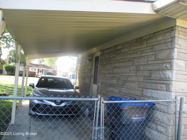 exterior space with a carport