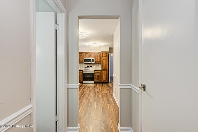 hall featuring light hardwood / wood-style floors