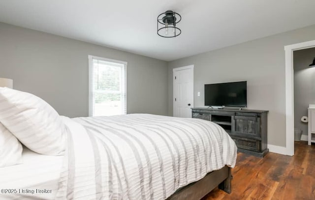 bedroom featuring dark hardwood / wood-style floors