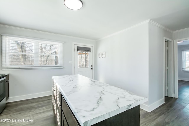 kitchen featuring a center island, ornamental molding, dark brown cabinets, dark hardwood / wood-style floors, and electric range