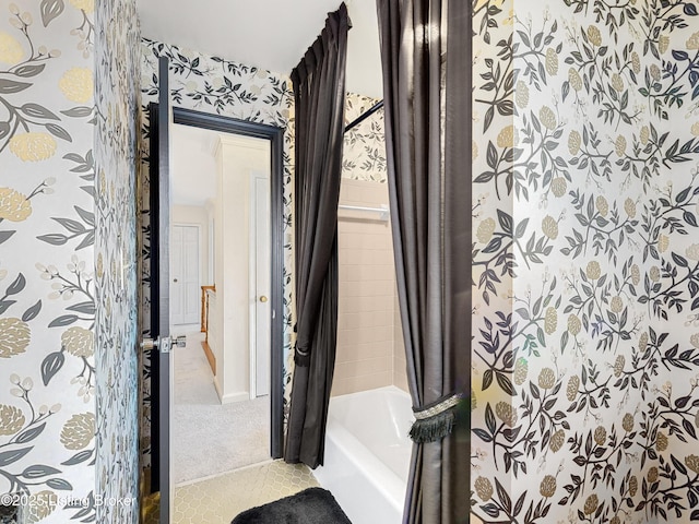 bathroom featuring shower / bathtub combination with curtain