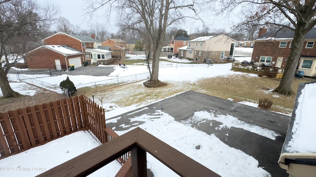 view of yard covered in snow