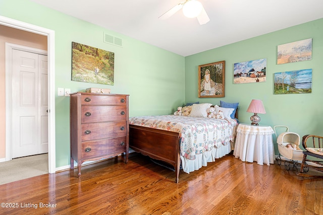 bedroom featuring ceiling fan and wood-type flooring