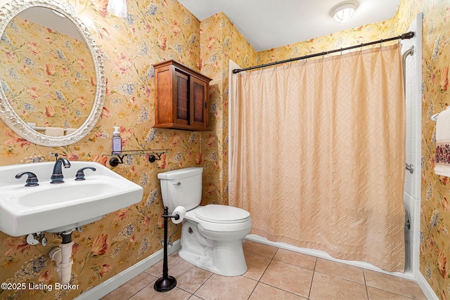 bathroom featuring tile patterned floors and toilet