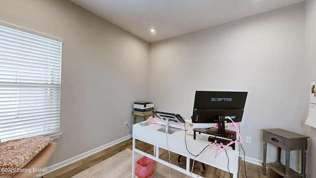 office area with wood-type flooring