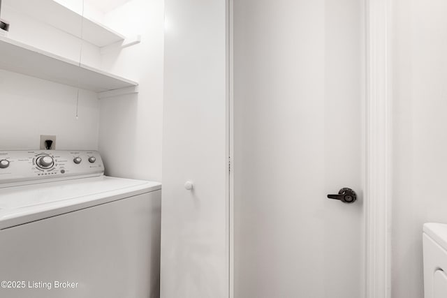 washroom with separate washer and dryer