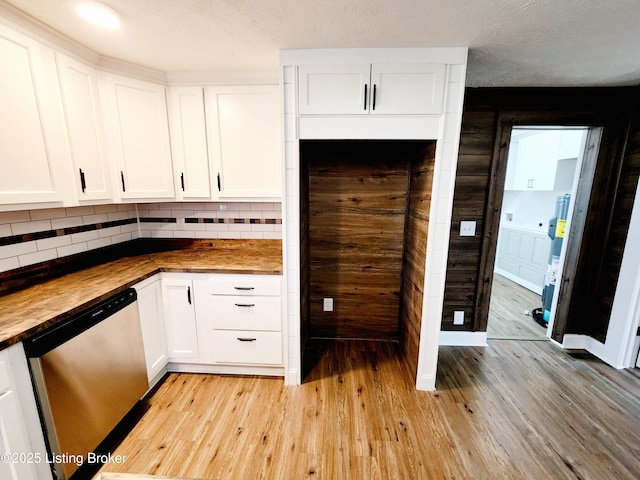 kitchen featuring butcher block countertops, white cabinetry, dishwasher, backsplash, and light hardwood / wood-style floors