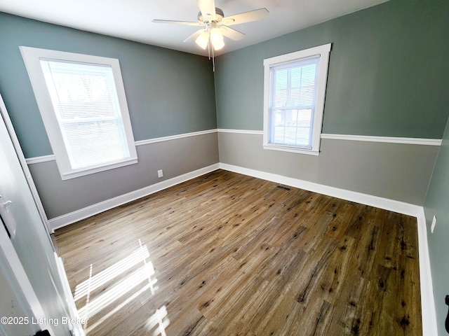 unfurnished room featuring ceiling fan and light wood-type flooring