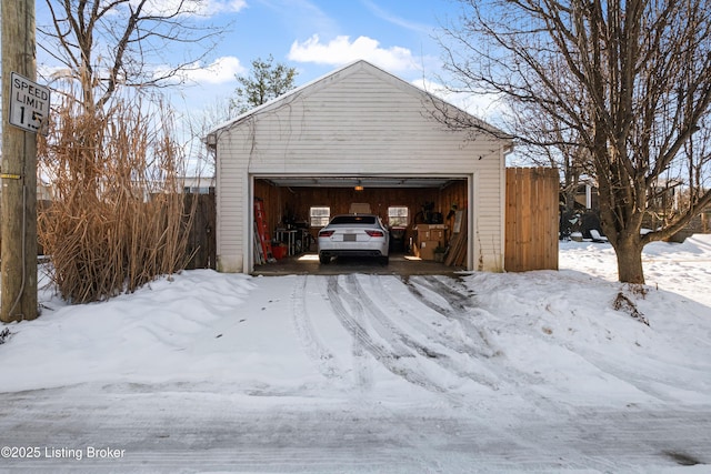 view of snow covered garage