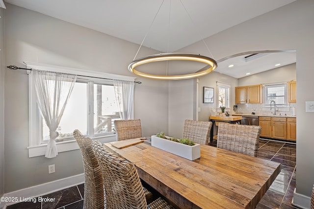 dining room featuring sink