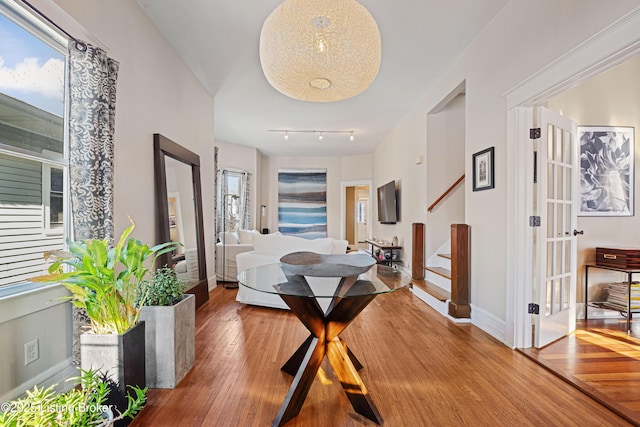 hallway featuring wood-type flooring