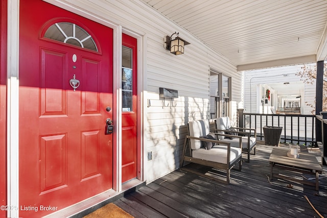 property entrance featuring covered porch