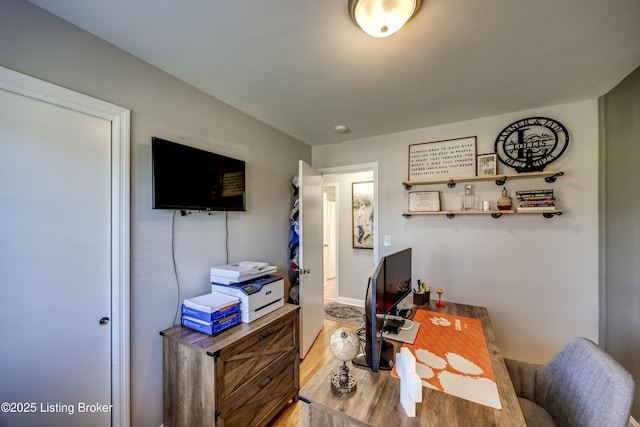 office area with wood-type flooring