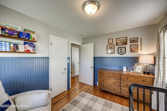 bedroom with wood-type flooring