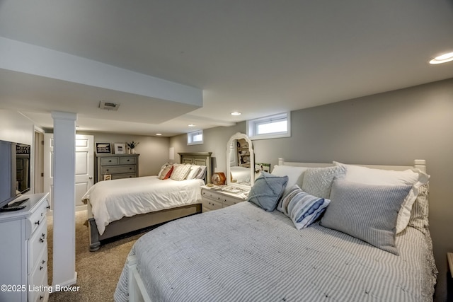 bedroom featuring light colored carpet