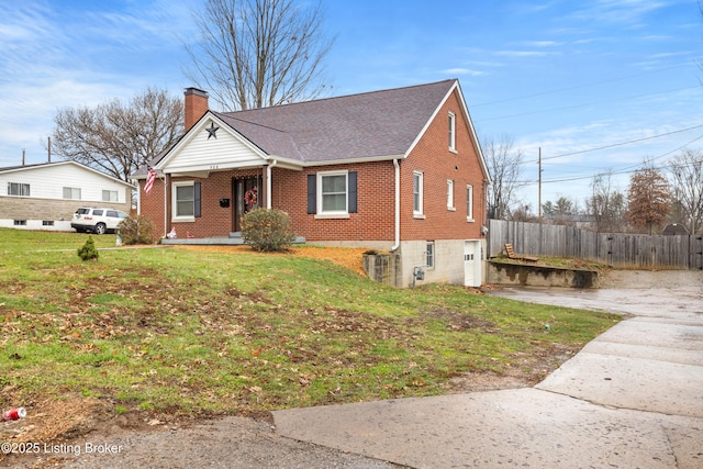 view of front of property with a porch and a front lawn