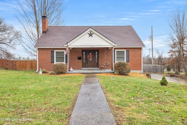 bungalow featuring a front yard