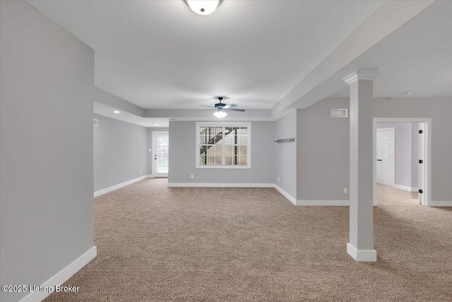 unfurnished living room with ceiling fan and light carpet