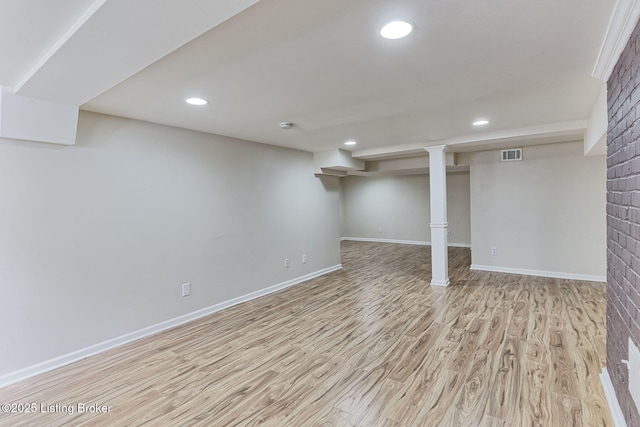 basement featuring light wood-type flooring