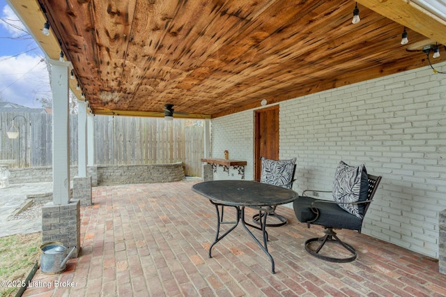 view of patio / terrace featuring ceiling fan