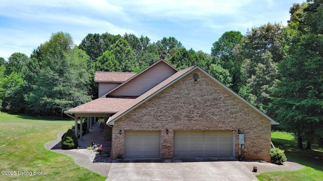 view of property featuring a garage and a front lawn