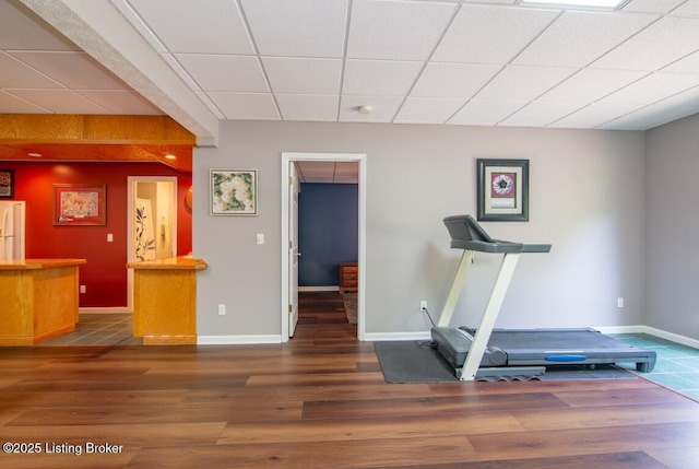 workout room with dark hardwood / wood-style flooring