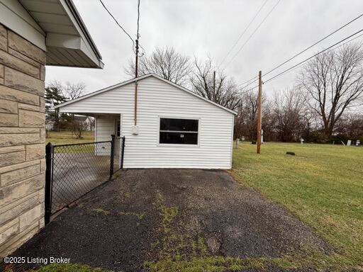 view of home's exterior featuring a yard