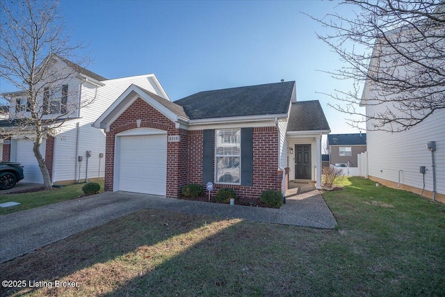 view of front facade with a front yard and a garage