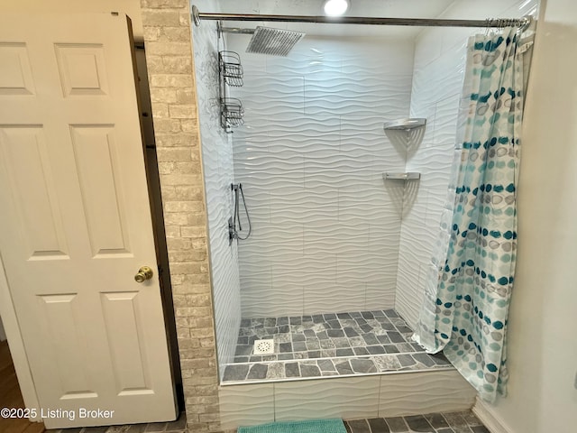 bathroom featuring walk in shower