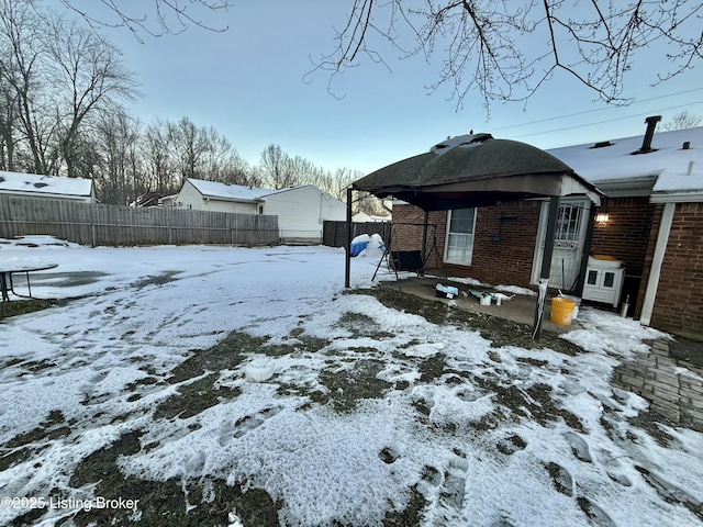 view of yard covered in snow