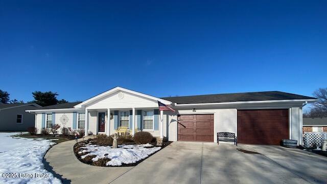 ranch-style home with a garage