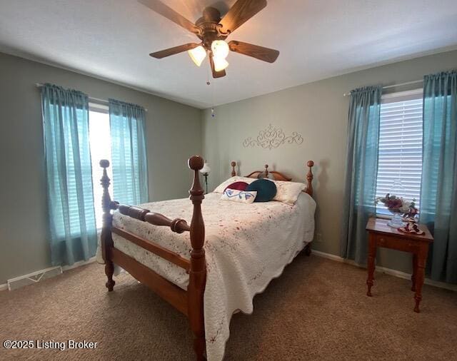 bedroom with ceiling fan and carpet flooring