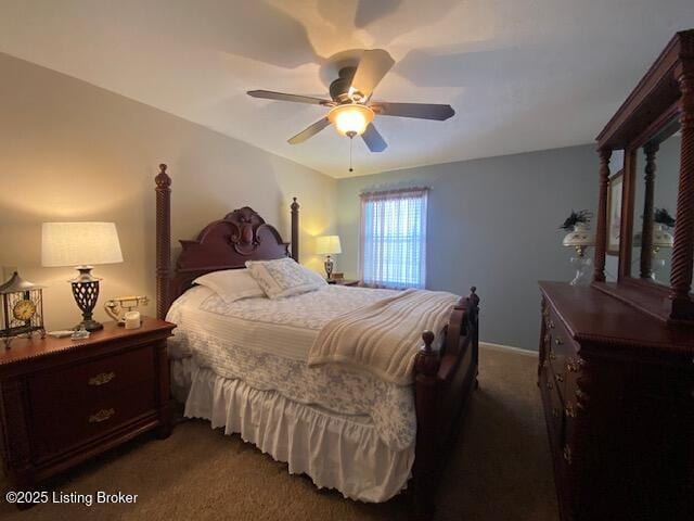 bedroom with dark colored carpet and ceiling fan