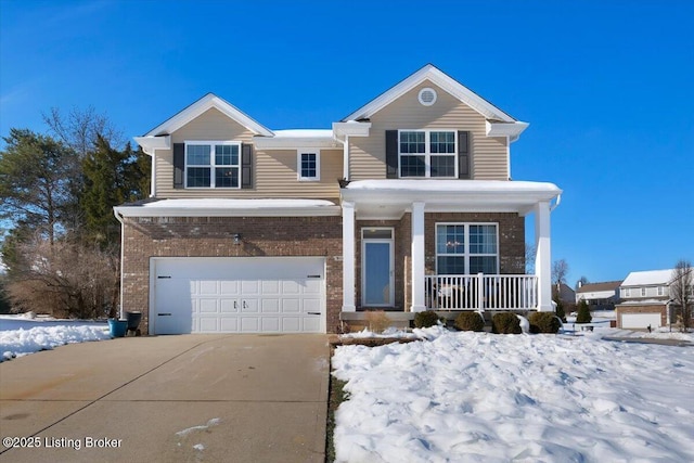 view of front of house with a garage and covered porch