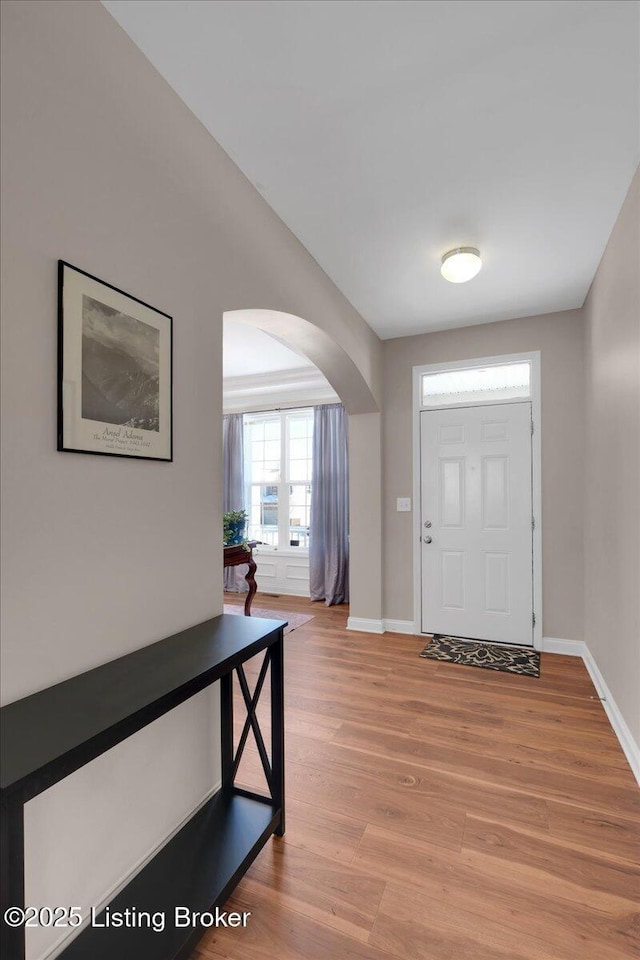 entryway featuring hardwood / wood-style flooring