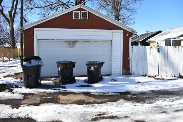 view of snow covered garage