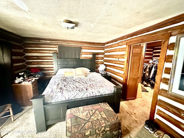 carpeted bedroom with a closet, log walls, and a textured ceiling