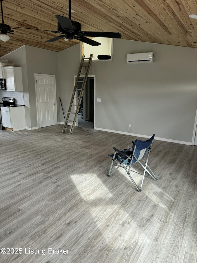 unfurnished living room with vaulted ceiling, a wall mounted air conditioner, wood ceiling, and light hardwood / wood-style flooring