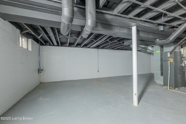 basement featuring heating unit