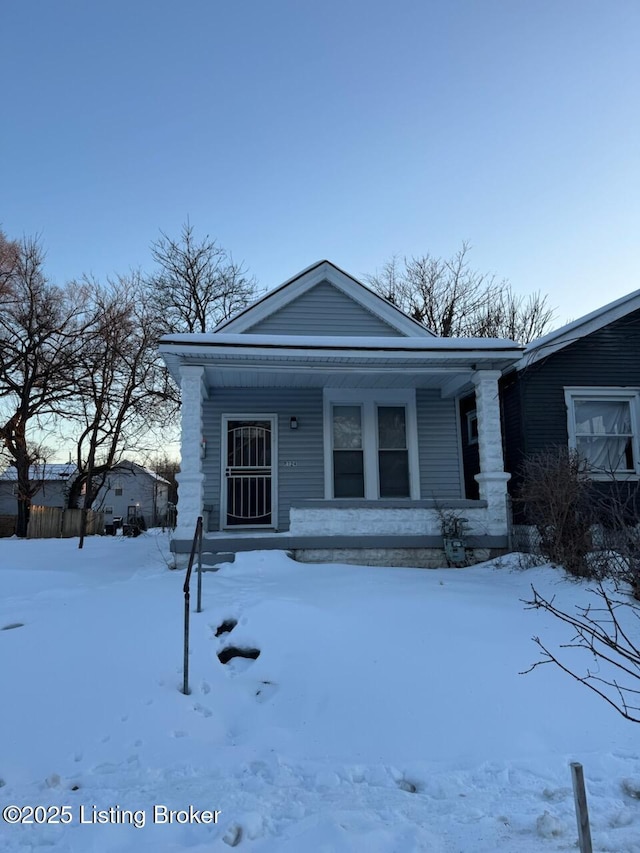 view of front of property featuring covered porch