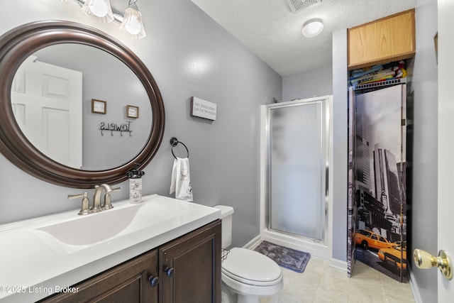 bathroom with toilet, an enclosed shower, vanity, and a textured ceiling