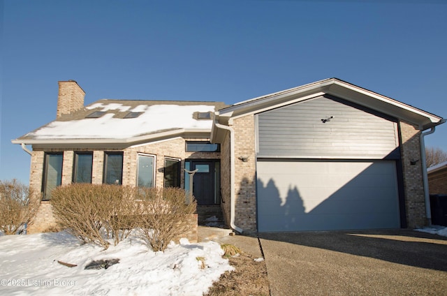 view of front of property featuring a garage