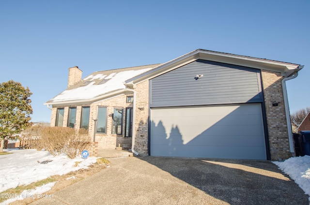 view of front of home with a garage