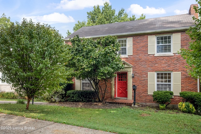 view of front of property featuring a front yard