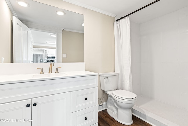 bathroom with curtained shower, wood-type flooring, vanity, toilet, and ornamental molding