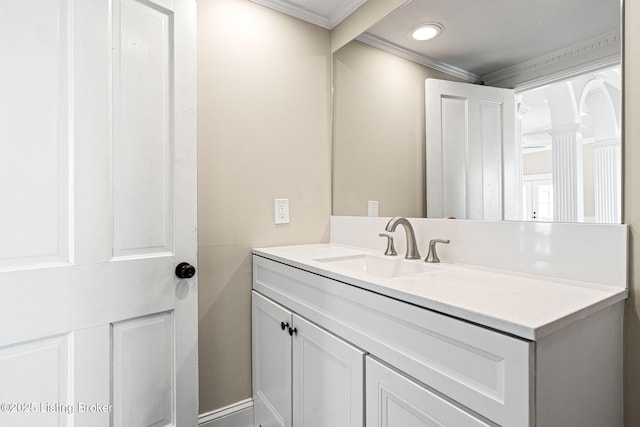 bathroom featuring vanity and crown molding