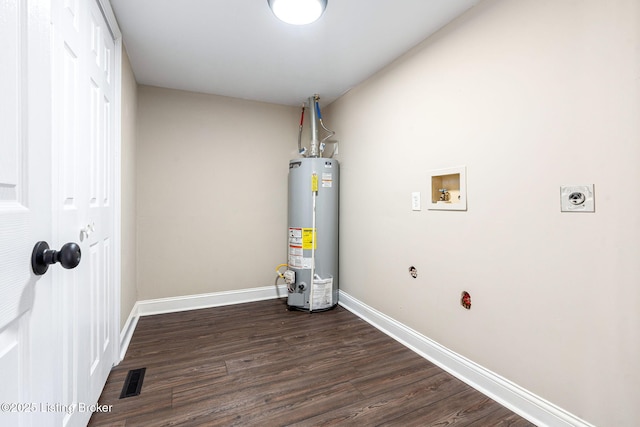 utility room featuring gas water heater