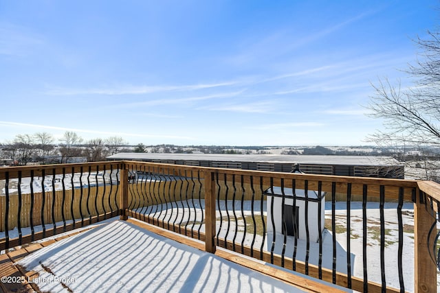 view of snow covered deck