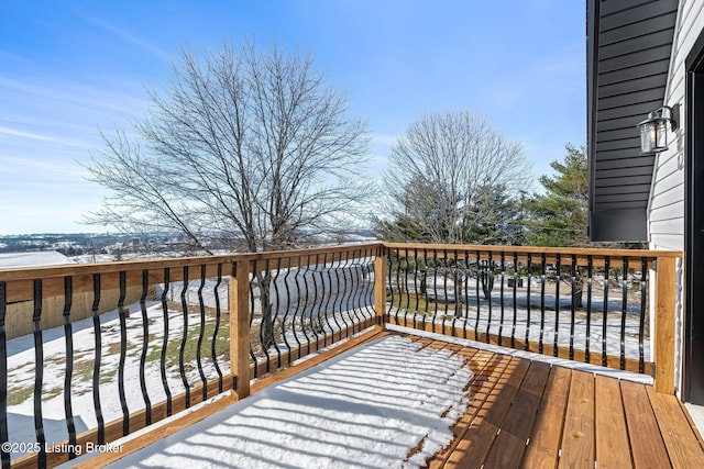 view of snow covered deck