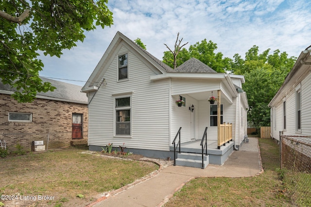 view of front of home with a front yard